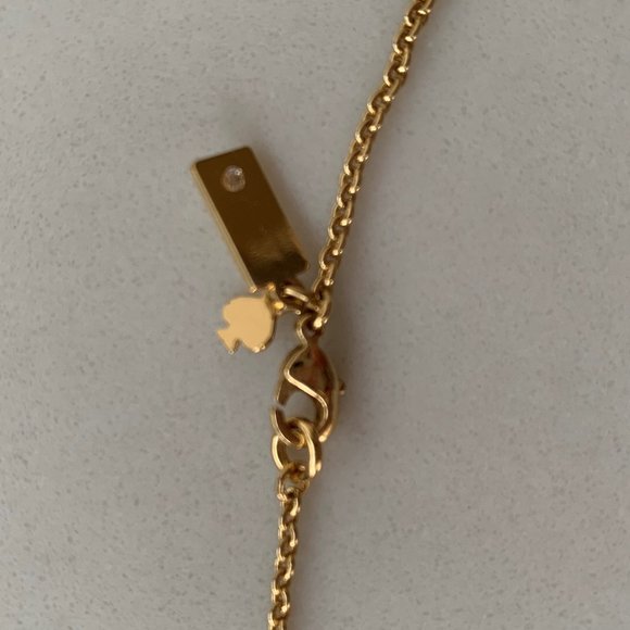 Kate Spade "Take a Bow" gold necklace - Picture 4 of 7